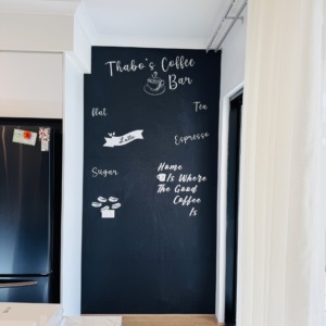 Modern coffee shop interior with stylish wallpaper design in Perth